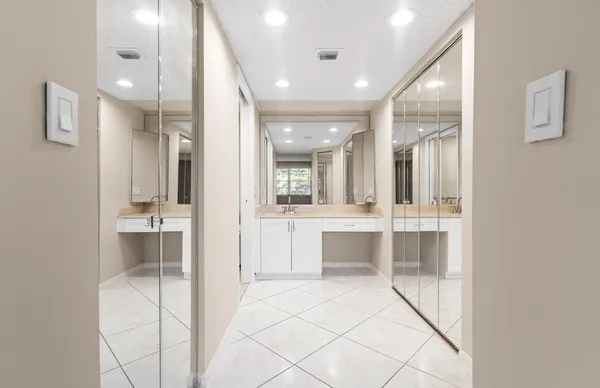 a view of an empty room with windows