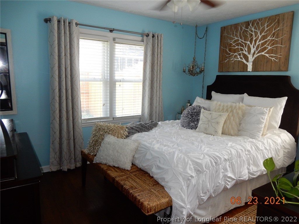 1001 Anarine Road Fayetteville, NC 28303 - Photo 14 of 24 a bedroom with a bed and window