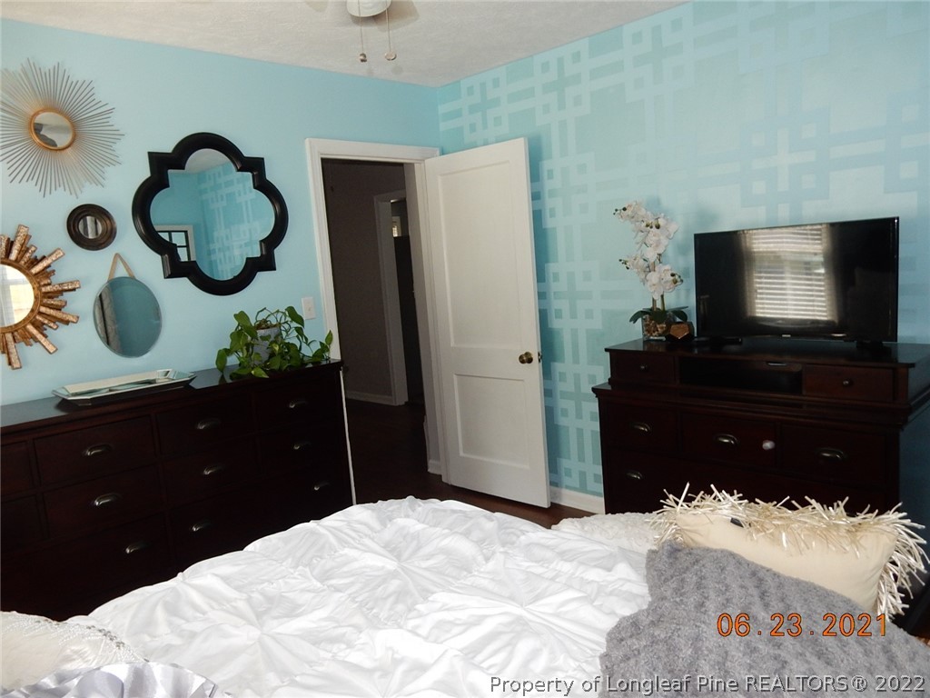 1001 Anarine Road Fayetteville, NC 28303 - Photo 15 of 24 a bedroom with a bed and a dresser