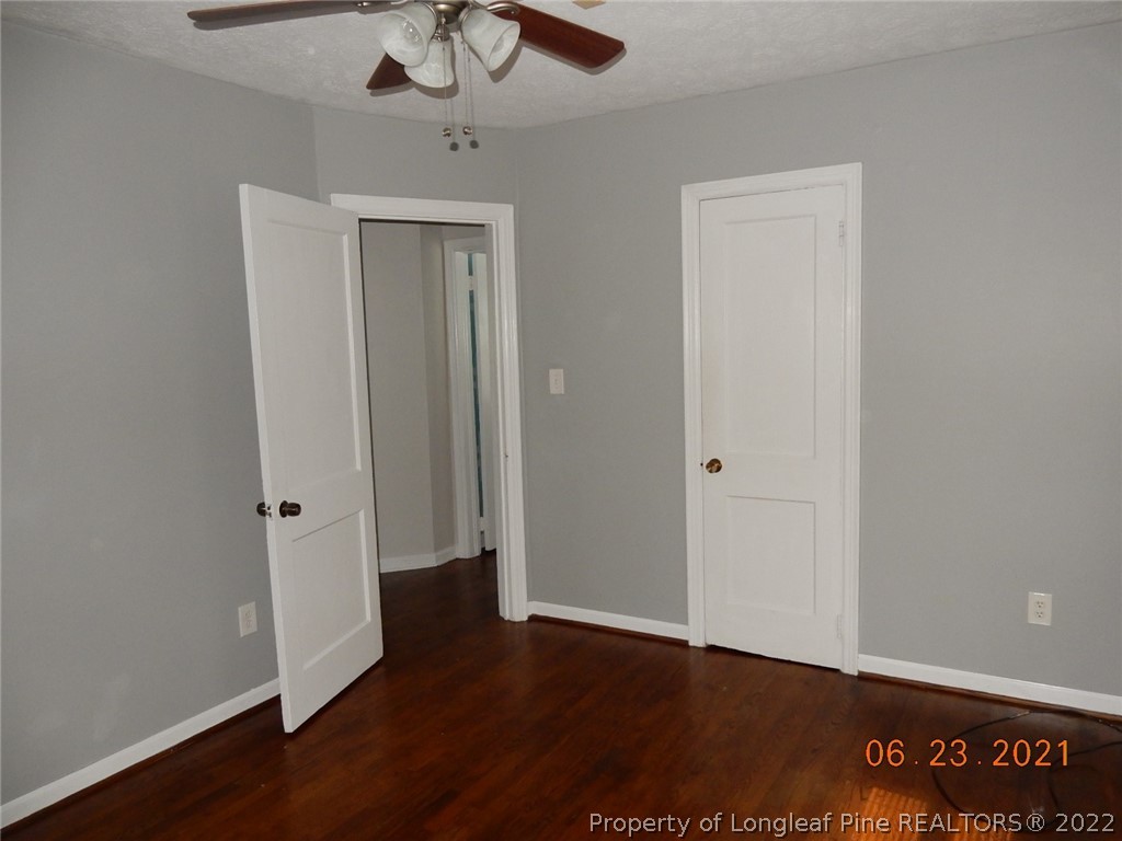 1001 Anarine Road Fayetteville, NC 28303 - Photo 18 of 24 a view of a hallway with wooden floor