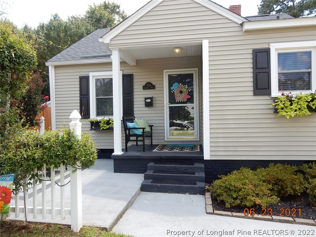 1001 Anarine Road Fayetteville, NC 28303 - Photo 23 of 24 a front view of a house with a yard