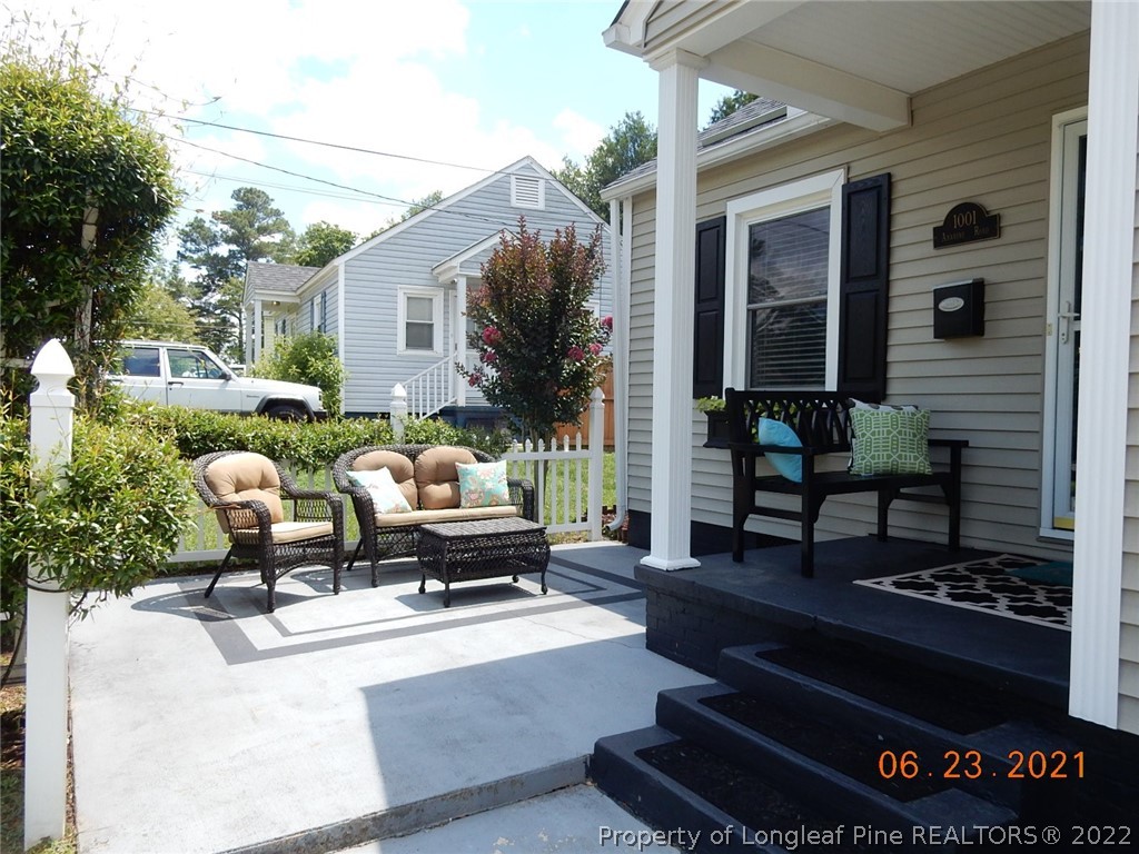 1001 Anarine Road Fayetteville, NC 28303 - Photo 24 of 24 a roof deck with couches and a potted plant on the table