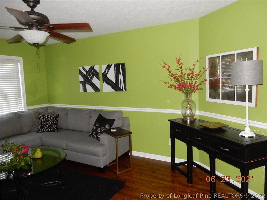 1001 Anarine Road Fayetteville, NC 28303 - Photo 4 of 24 a living room with furniture and a potted plant