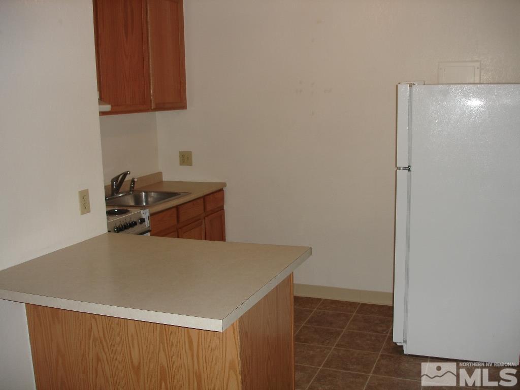 2450 Lymbery Street, Unit 309 Reno, NV 89509 - Photo 4 of 10 a utility room with a sink
