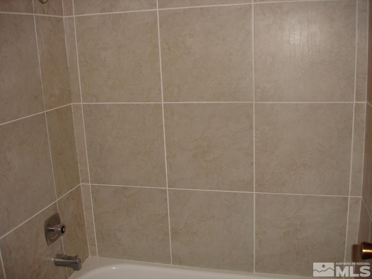 2450 Lymbery Street, Unit 309 Reno, NV 89509 - Photo 7 of 10 a bathroom with a shower