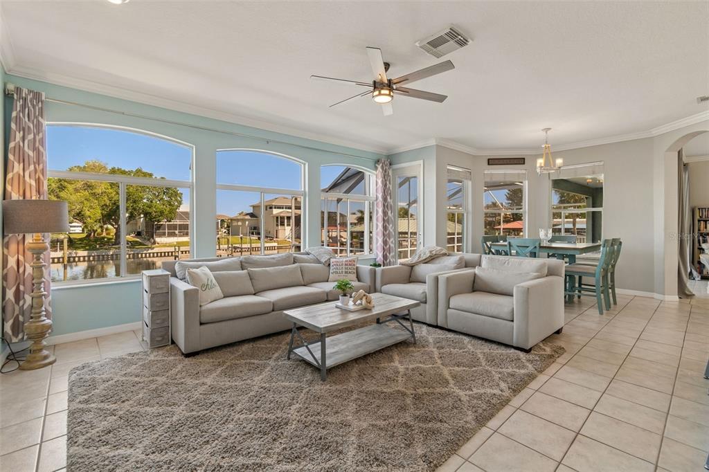 703 Bunker View Drive Apollo Beach, FL 33572 - Photo 15 of 49 a living room with furniture and a view of kitchen