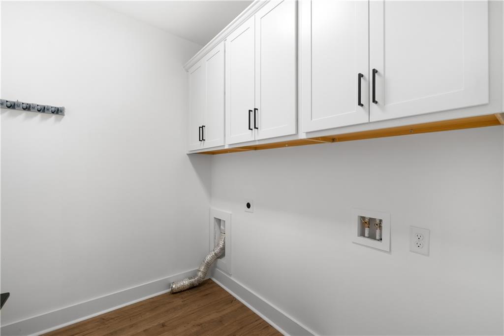 3321 Orwell Way, Unit 3301 Cumming, GA 30041 - Photo 14 of 43 a view of a room with rack on the wall