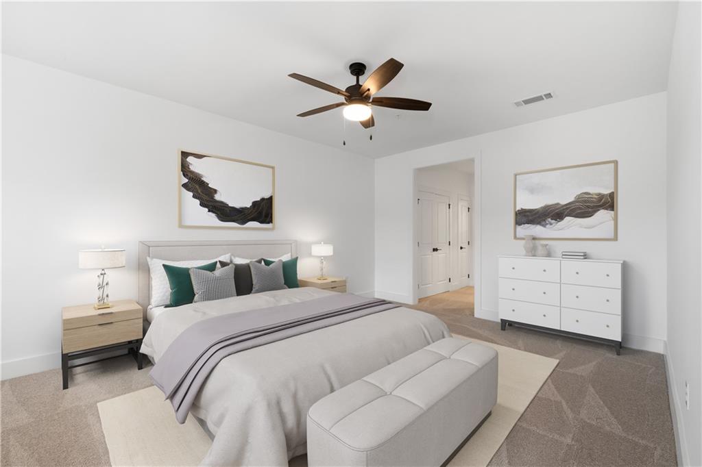 3321 Orwell Way, Unit 3301 Cumming, GA 30041 - Photo 19 of 43 a bedroom with a bed and a chandelier