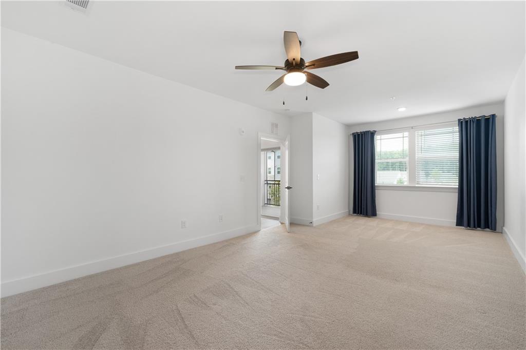3321 Orwell Way, Unit 3301 Cumming, GA 30041 - Photo 20 of 43 a view of an empty room with a window
