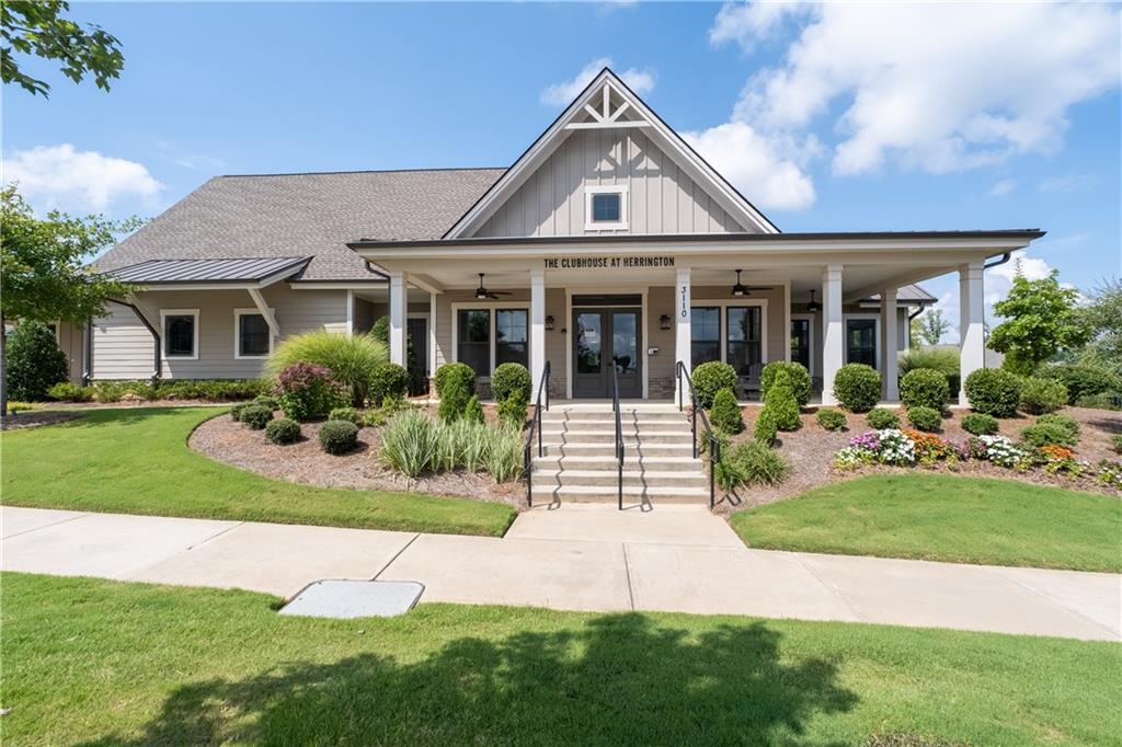 3321 Orwell Way, Unit 3301 Cumming, GA 30041 - Photo 33 of 43 a front view of a house with a yard