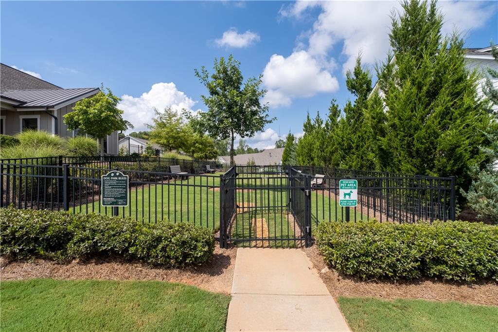 3321 Orwell Way, Unit 3301 Cumming, GA 30041 - Photo 36 of 43 a view of a house with a garden