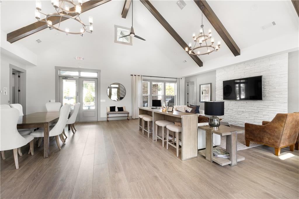 3321 Orwell Way, Unit 3301 Cumming, GA 30041 - Photo 38 of 43 a living room with furniture and a flat screen tv