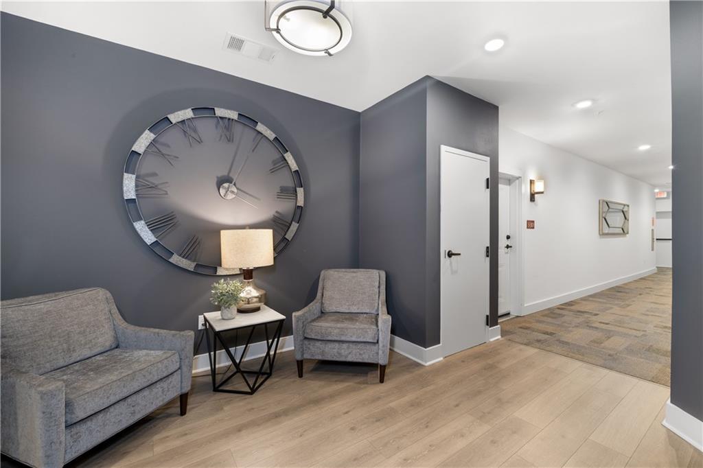 3321 Orwell Way, Unit 3301 Cumming, GA 30041 - Photo 7 of 43 a very nice looking room with a mirror