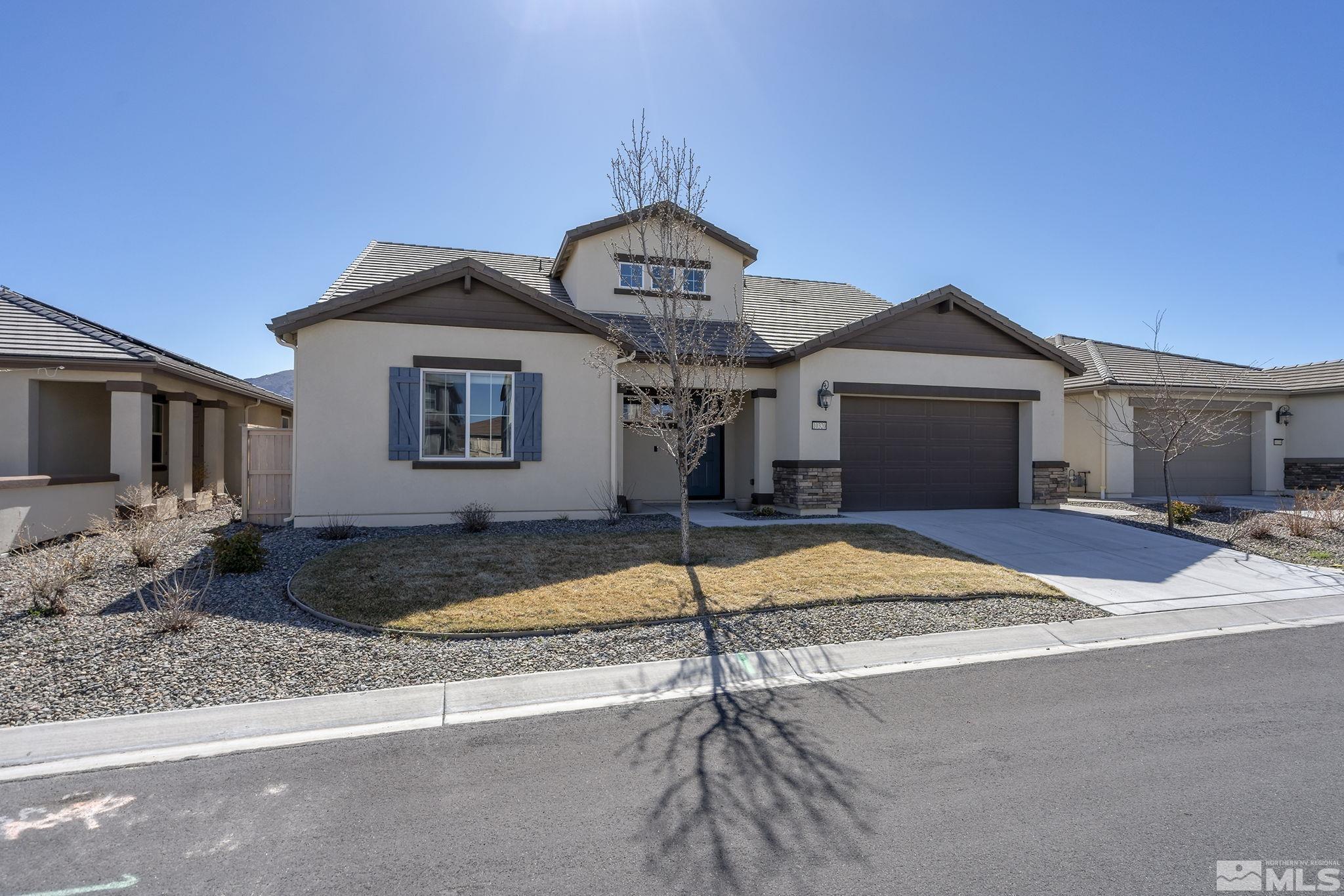 10320 Culiacan Pass Trail Reno, NV 89521 - Photo 2 of 33 a front view of a house with garden