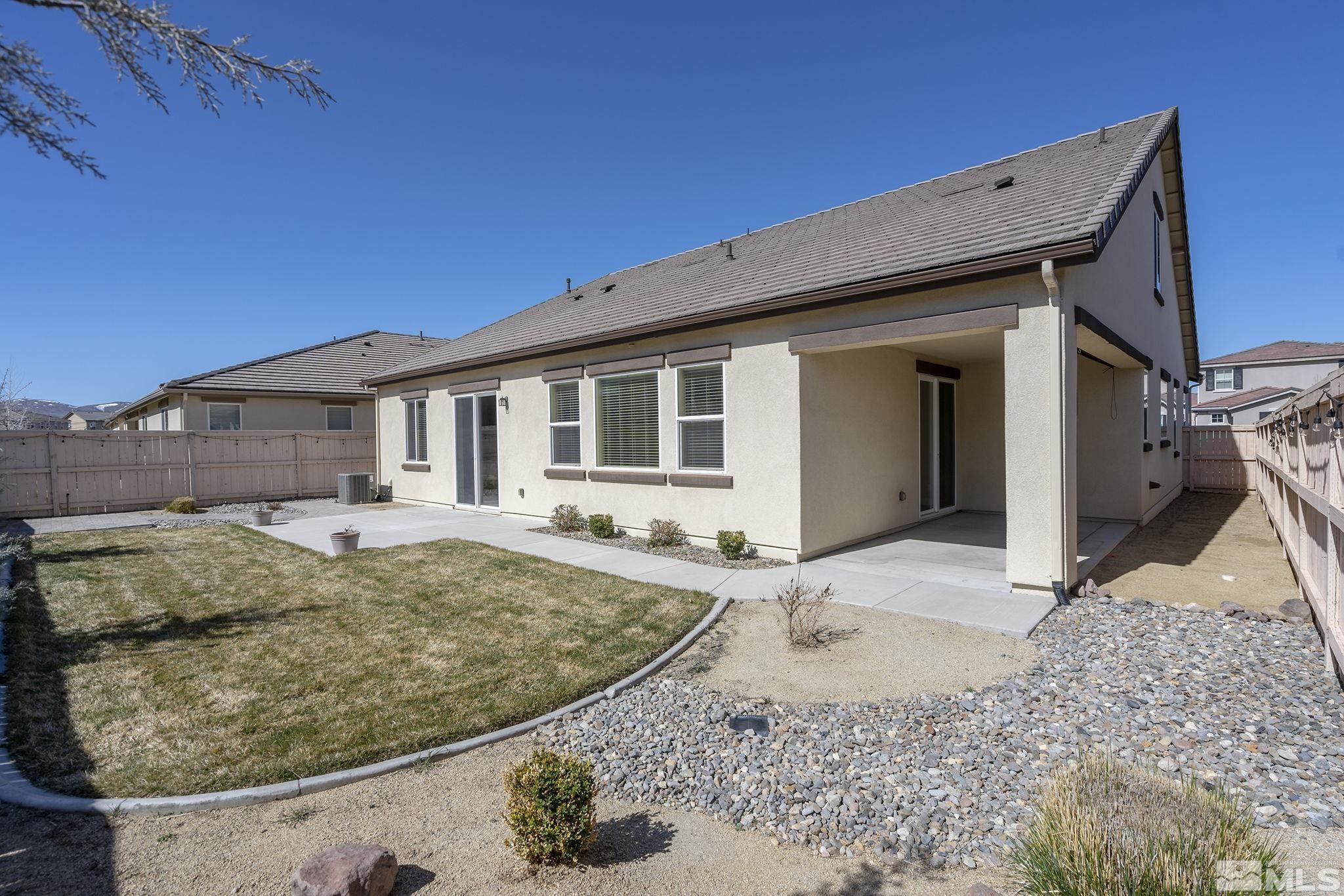 10320 Culiacan Pass Trail Reno, NV 89521 - Photo 29 of 33 a view of a house with backyard