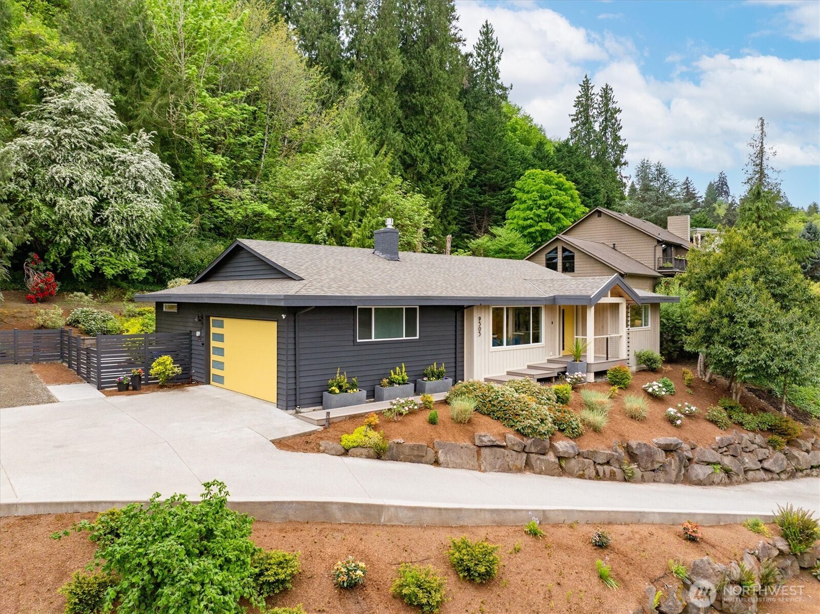 9503 Odin Way Bothell, WA 98011 - Photo 32 of 39 a front view of a house with a yard
