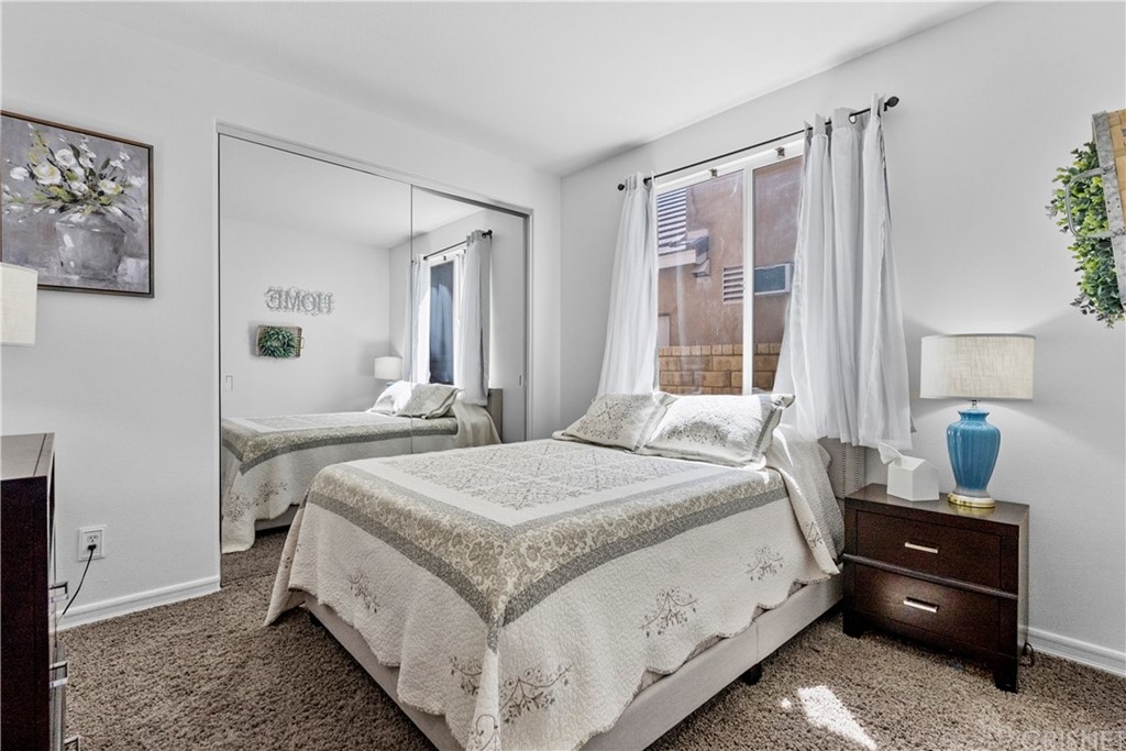 19654 Mathilde Lane Saugus, CA 91350 - Photo 15 of 38 a bedroom with a bed and a window