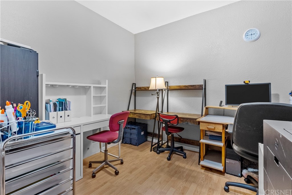 19654 Mathilde Lane Saugus, CA 91350 - Photo 18 of 38 a view of a workspace with furniture and a window