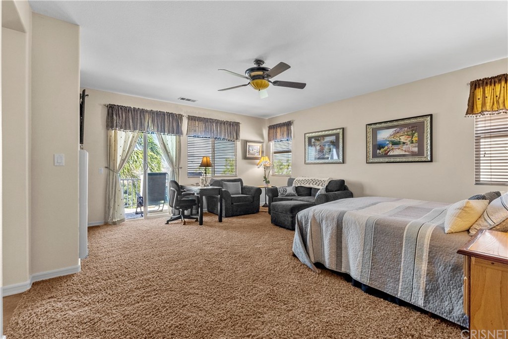 19654 Mathilde Lane Saugus, CA 91350 - Photo 23 of 38 a bed room with bed and window