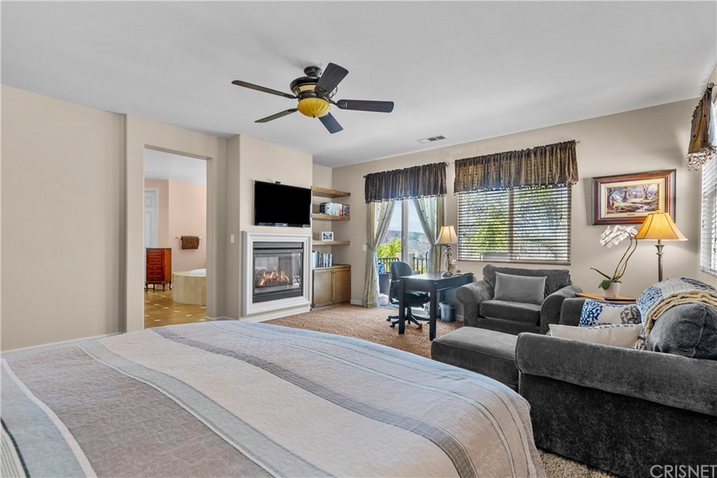 19654 Mathilde Lane Saugus, CA 91350 - Photo 24 of 38 a bedroom with a bed and a couch