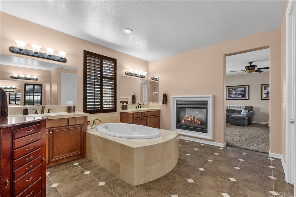 19654 Mathilde Lane Saugus, CA 91350 - Photo 28 of 38 a large room with a large window and a fireplace