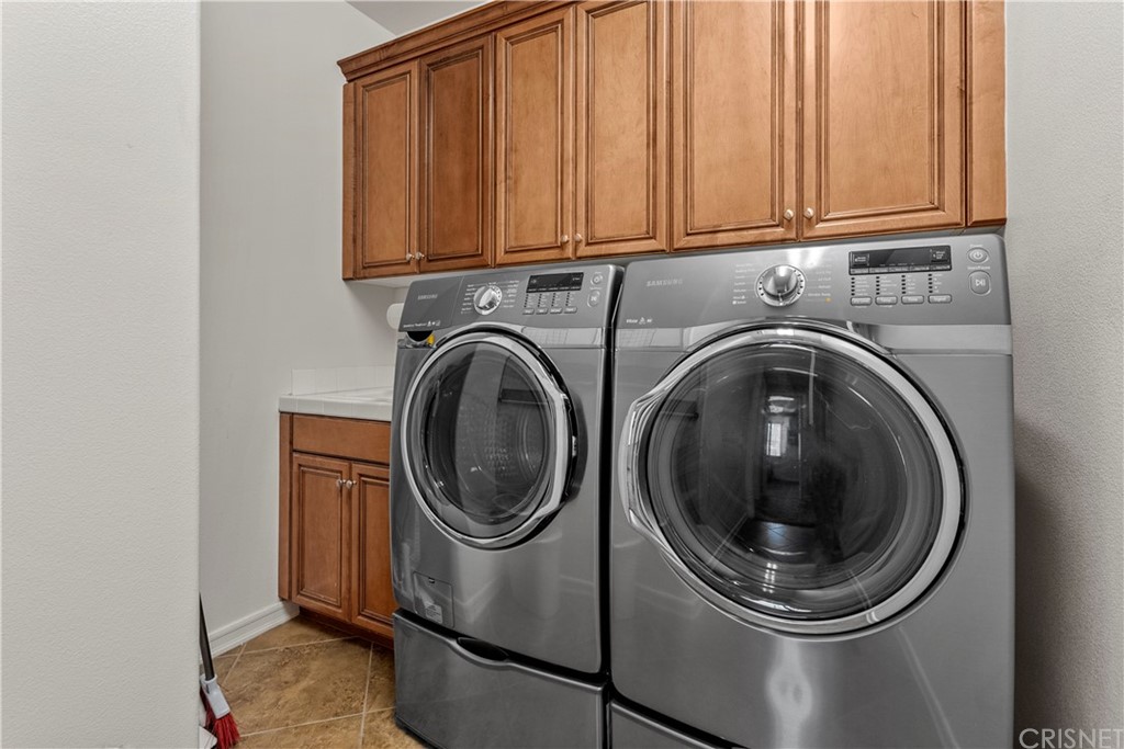 19654 Mathilde Lane Saugus, CA 91350 - Photo 30 of 38 a utility room with dryer and washer