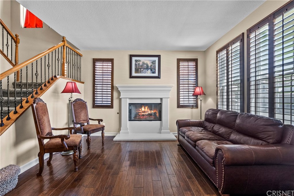 19654 Mathilde Lane Saugus, CA 91350 - Photo 5 of 38 a living room with furniture and a fireplace