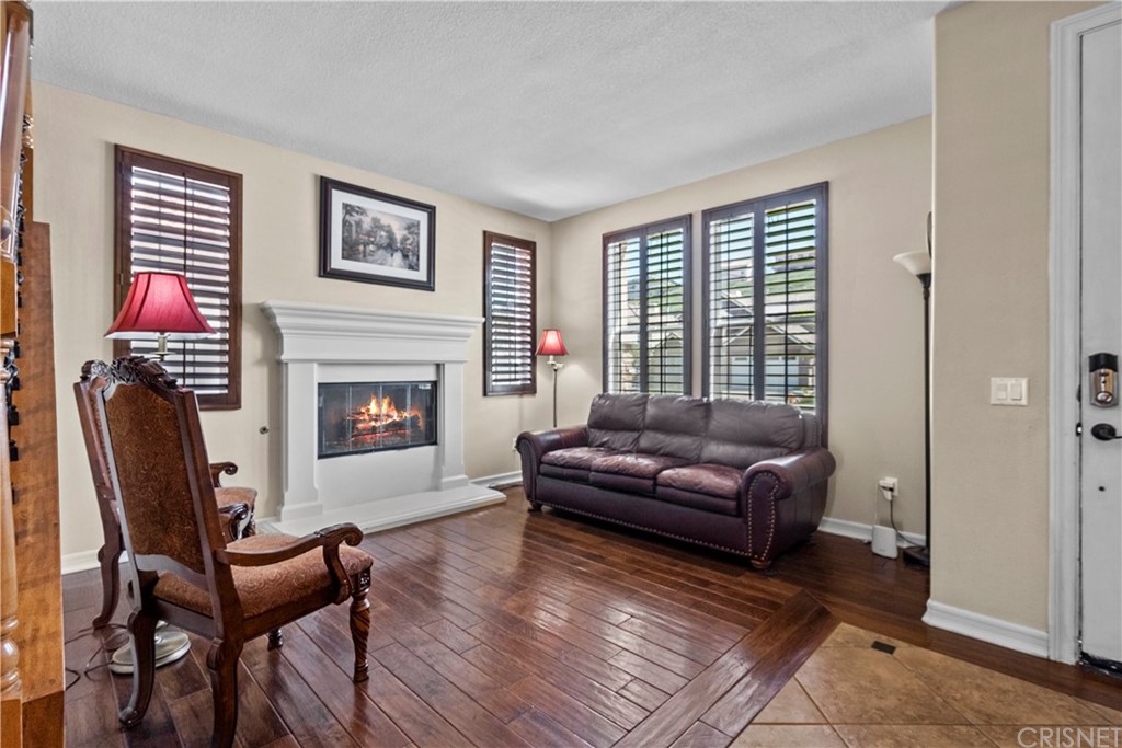 19654 Mathilde Lane Saugus, CA 91350 - Photo 6 of 38 a living room with furniture and a fireplace