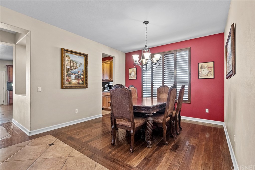 19654 Mathilde Lane Saugus, CA 91350 - Photo 7 of 38 a view of a dining room with furniture window and wooden floor