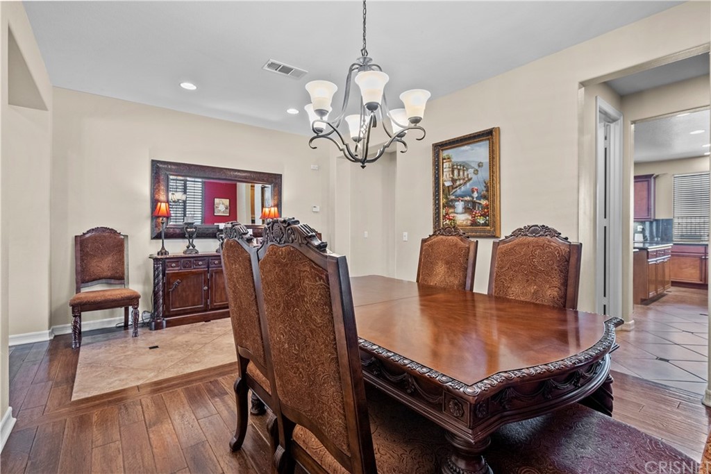 19654 Mathilde Lane Saugus, CA 91350 - Photo 8 of 38 a living room with furniture a chandelier and wooden floor