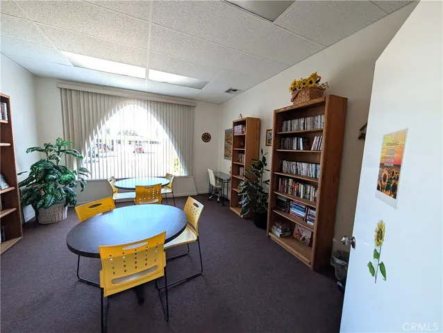 a room with furniture and a window