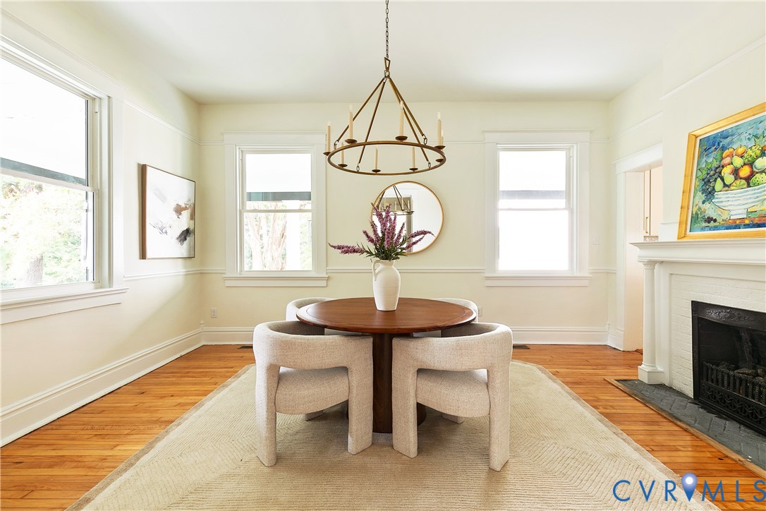 2402 Riverside Drive Richmond, VA 23225 - Photo 14 of 50 a dining room with chandelier and a table