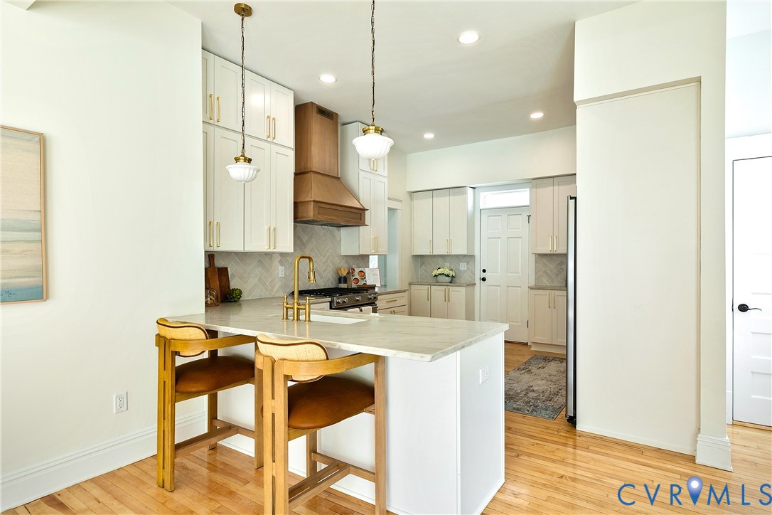 2402 Riverside Drive Richmond, VA 23225 - Photo 19 of 50 a view of a kitchen and kitchen island