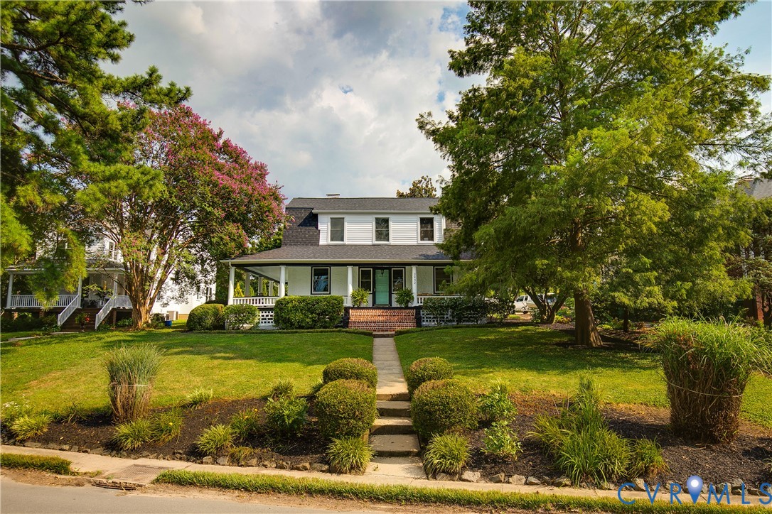 2402 Riverside Drive Richmond, VA 23225 - Photo 2 of 50 a front view of a house with a yard