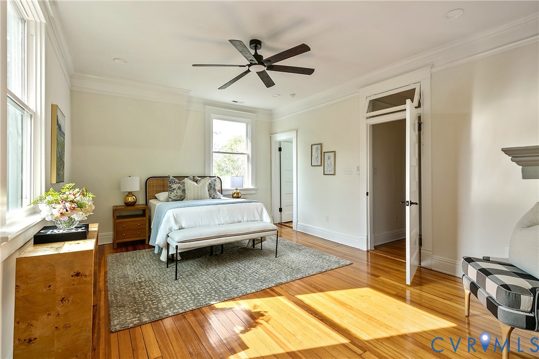 2402 Riverside Drive Richmond, VA 23225 - Photo 27 of 50 a bedroom with a bed and ceiling fan