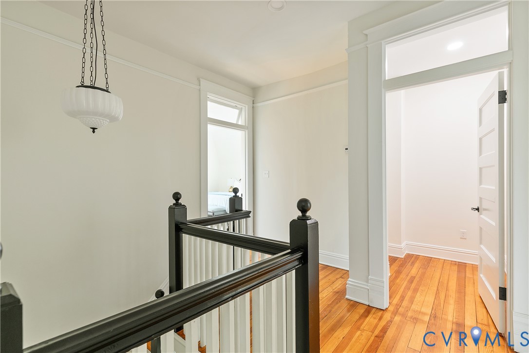 2402 Riverside Drive Richmond, VA 23225 - Photo 38 of 50 a view of a hallway with a chandelier
