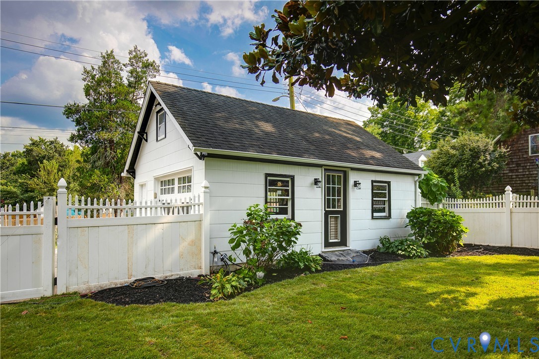 2402 Riverside Drive Richmond, VA 23225 - Photo 43 of 50 a view of a house with backyard and garden