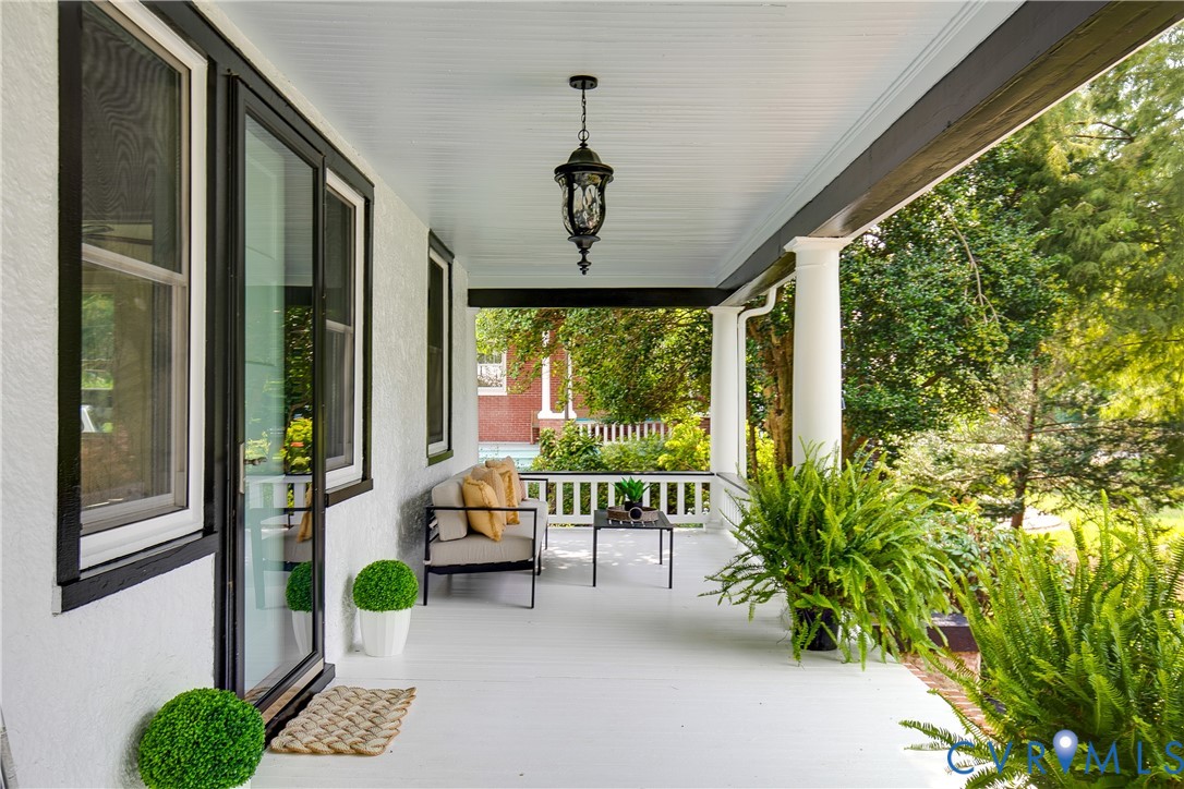 2402 Riverside Drive Richmond, VA 23225 - Photo 5 of 50 a living room with furniture and a window