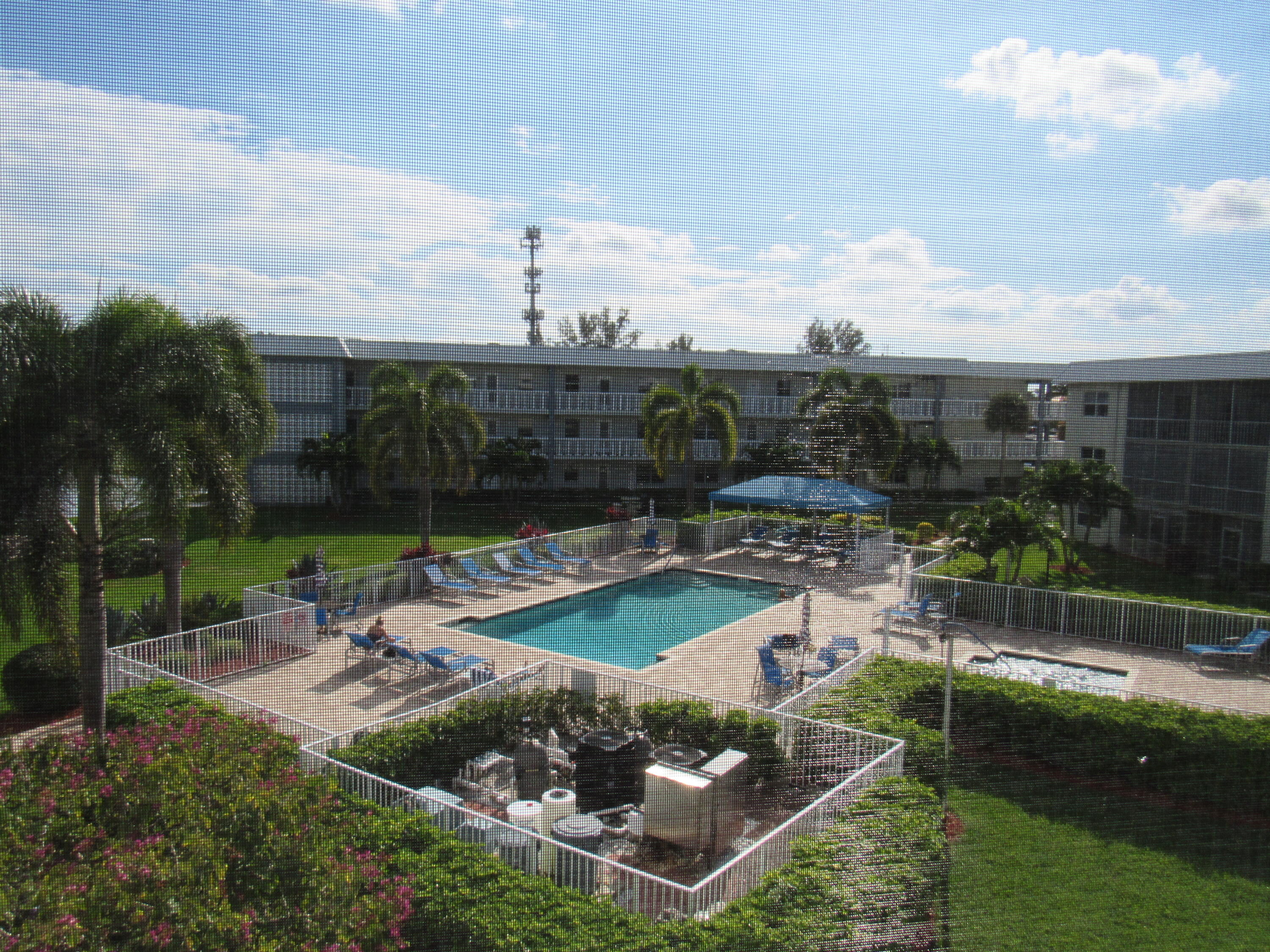 9872 Marina Boulevard, Unit 1438 Boca Raton, FL 33428 - Photo 16 of 18 a view of a backyard