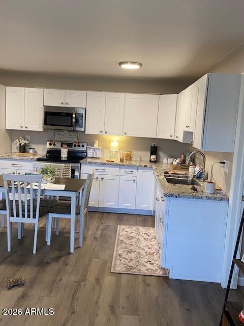 1440 North Idaho Road, Unit 2101 Apache Junction, AZ 85119 - Photo 3 of 23 1440 N Idaho #2101 Kitchen Dining Pic 1