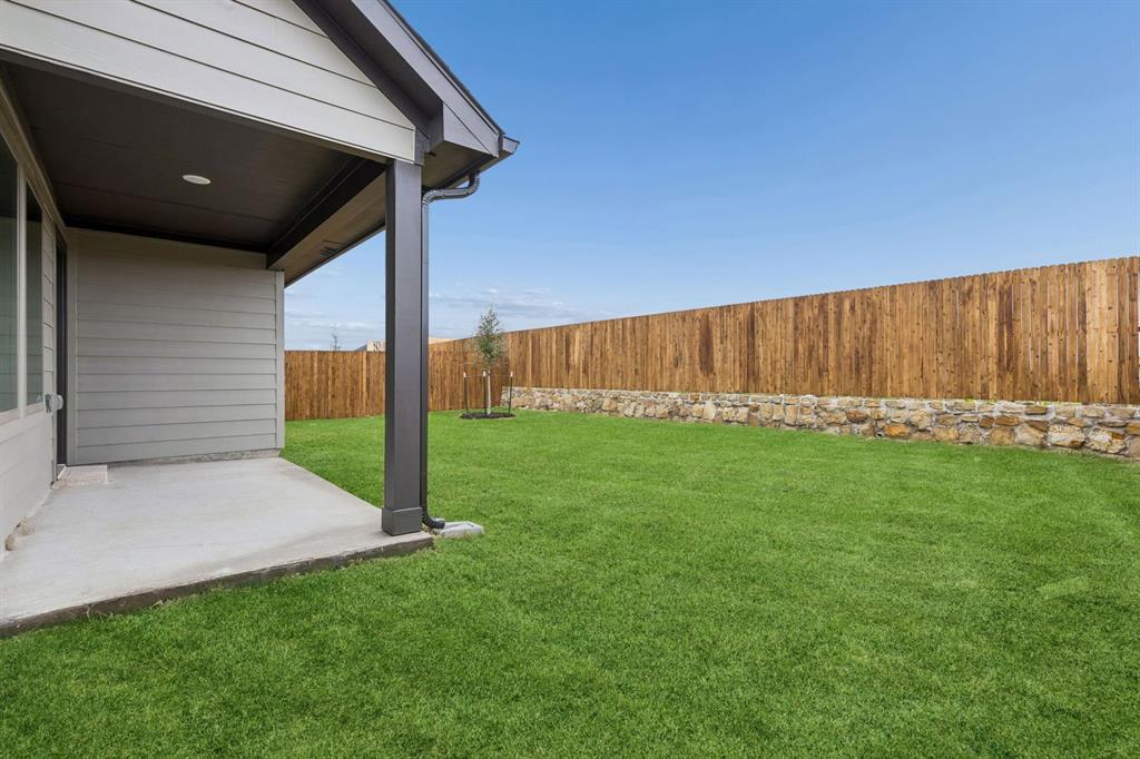 2305 Wind River Road Princeton, TX 75407 - Photo 27 of 32 Patio in the Oscar home plan by Trophy Signature Homes – REPRESENTATIVE PHOTO