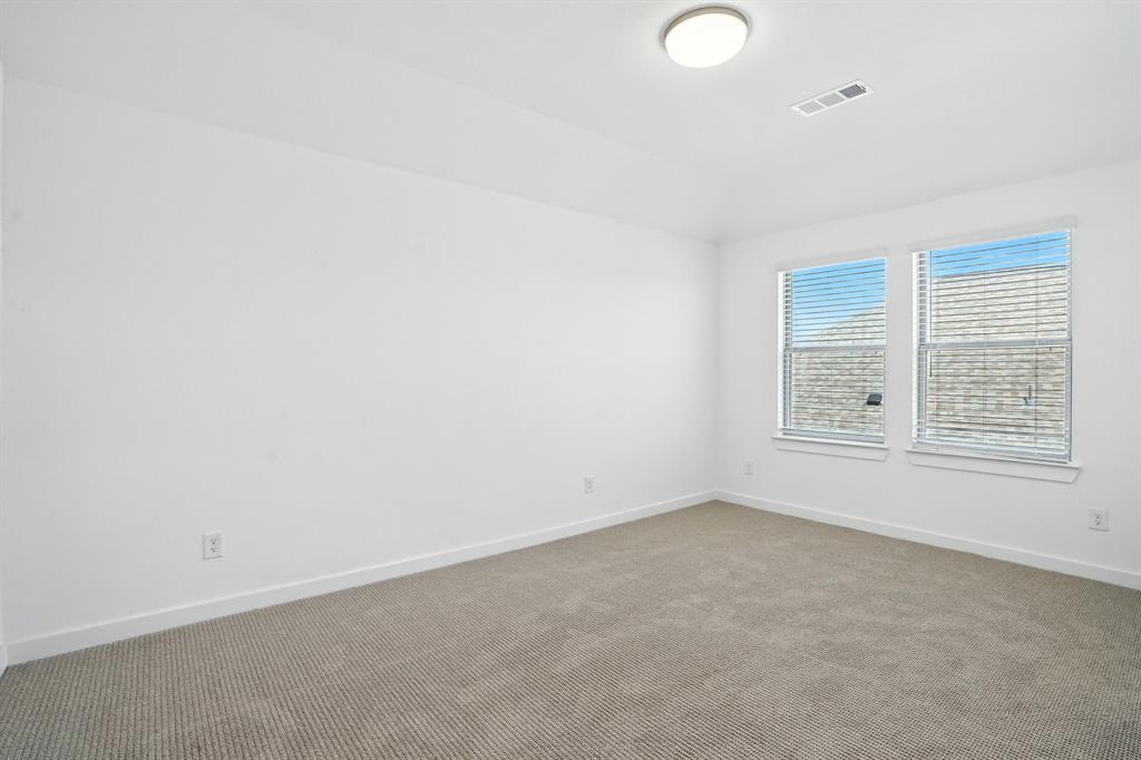 4621 Mount Vista Road Oak Point, TX 75068 - Photo 18 of 40 an empty room with windows