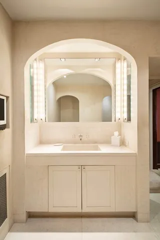 a dining room with a table and chairs