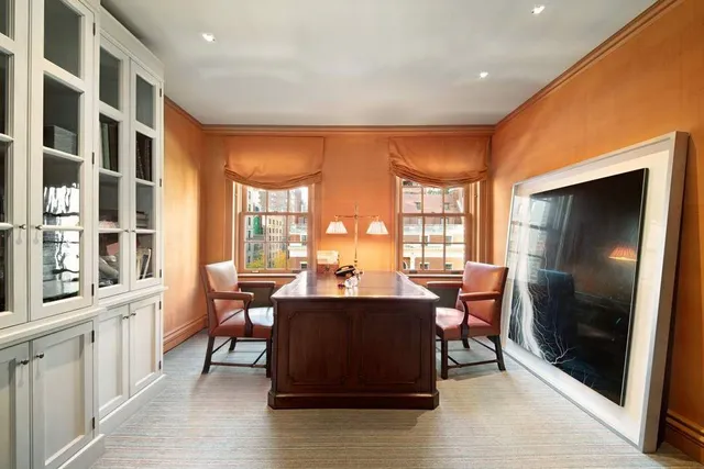 a bathroom with double vanity sink and a mirror
