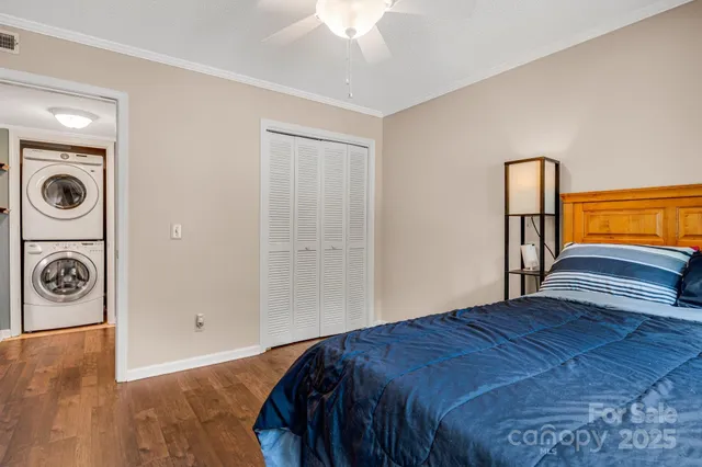 a utility room with sink dryer and washer