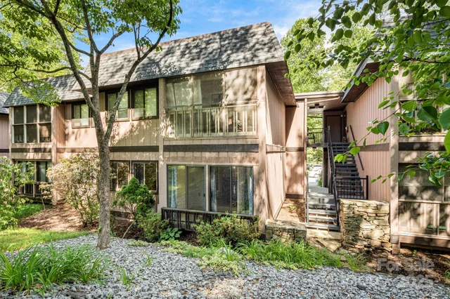 a car parked in front of a house