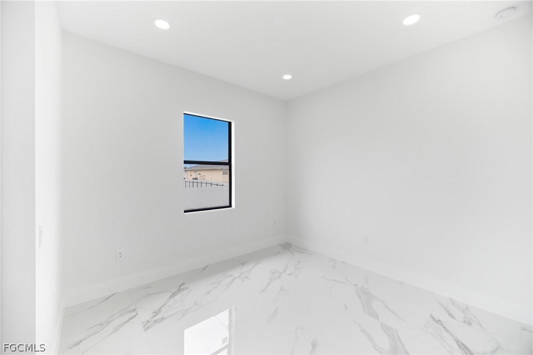 1013 Anson Avenue Lehigh Acres, FL 33971 - Photo 15 of 33 a view of an empty room