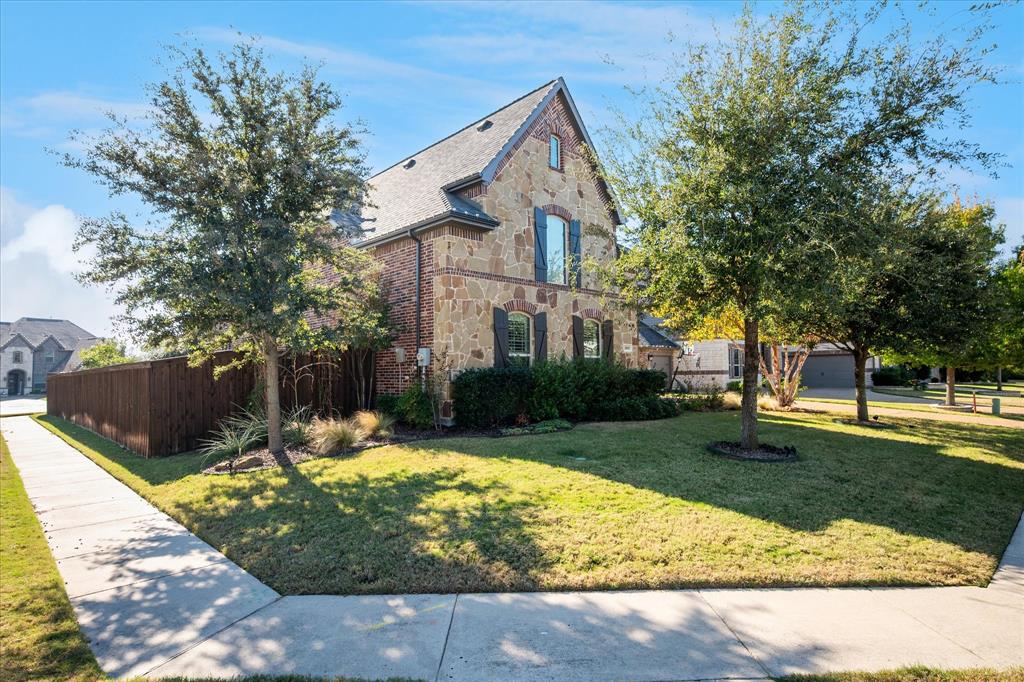 2880 Redfern Drive Trophy Club, TX 76262 - Photo 2 of 40 a view of a house with backyard and sitting area