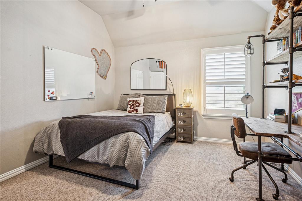 2880 Redfern Drive Trophy Club, TX 76262 - Photo 26 of 40 a bedroom with a bed and a window