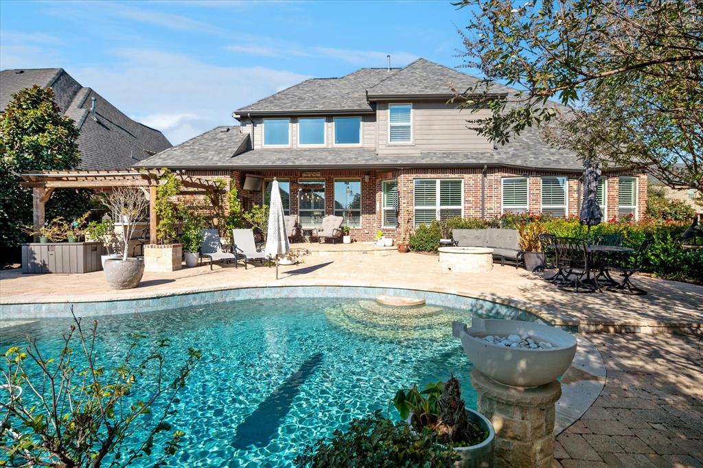 2880 Redfern Drive Trophy Club, TX 76262 - Photo 30 of 40 a view of a house with backyard and sitting area